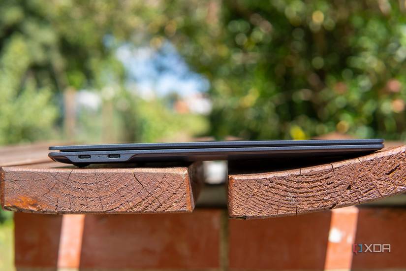 Left-side view of the LG Gram SuperSlim with the lid closed, showing two Thunderbolt 4
