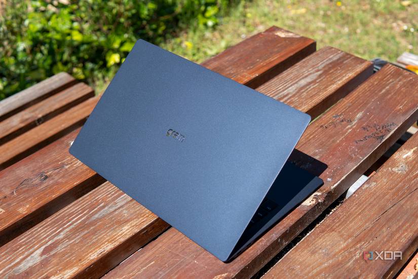 Angled rear view of the LG Gram SuperSlim facing right with the lid open at roughly 45 degrees