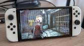 A Nintendo Switch OLED model running Resident Evil Revelations 2