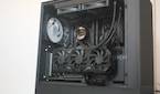 A PC built inside an NZXT H5 Flow RGB case that's all black