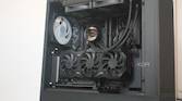 A PC built inside an NZXT H5 Flow RGB case that's all black