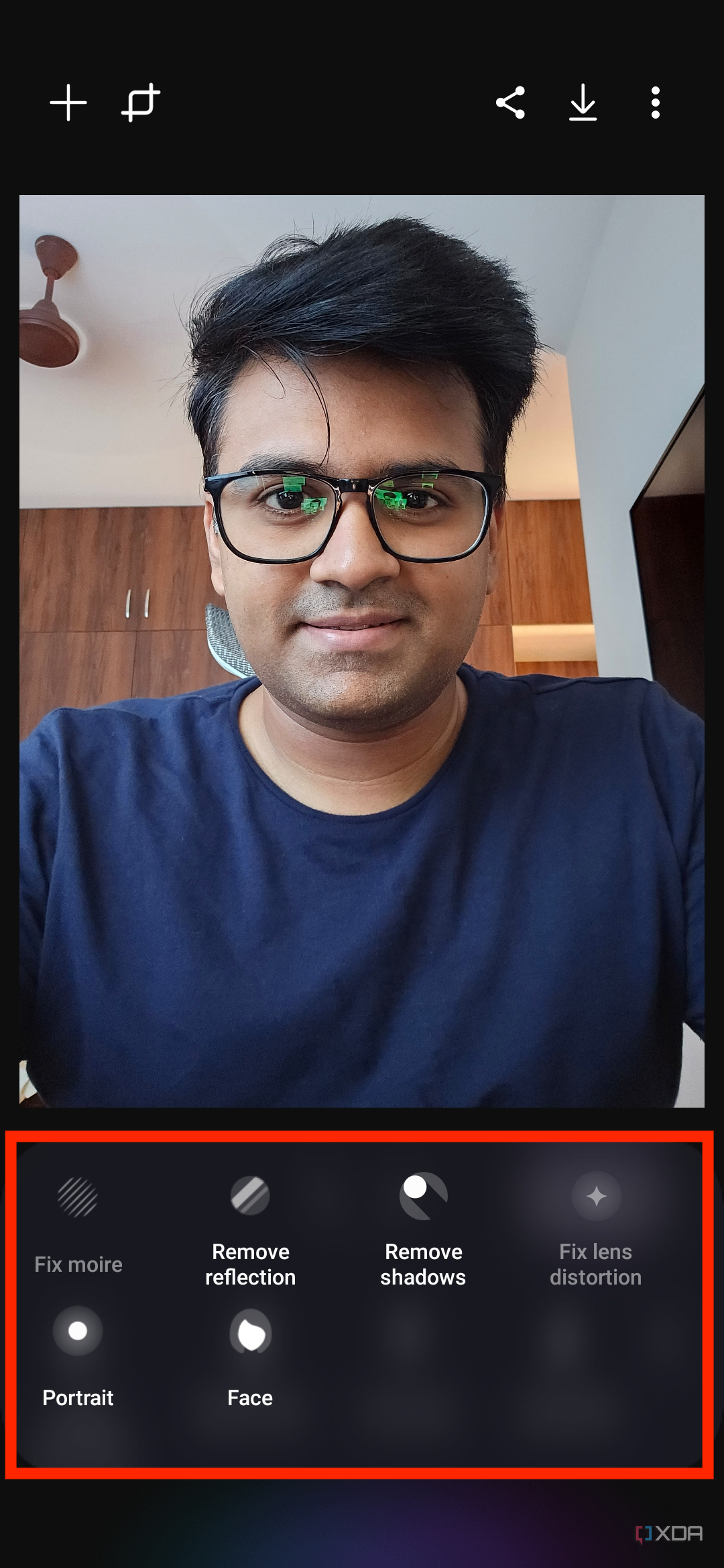 A screenshot highlighting editing tools with a selfie of a man being edited in the background.