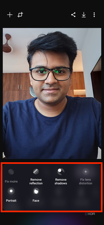 A screenshot highlighting editing tools with a selfie of a man being edited in the background.