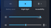 Screenshot of the Quick Actions panel with the Wi-Fi arrow button highlighted