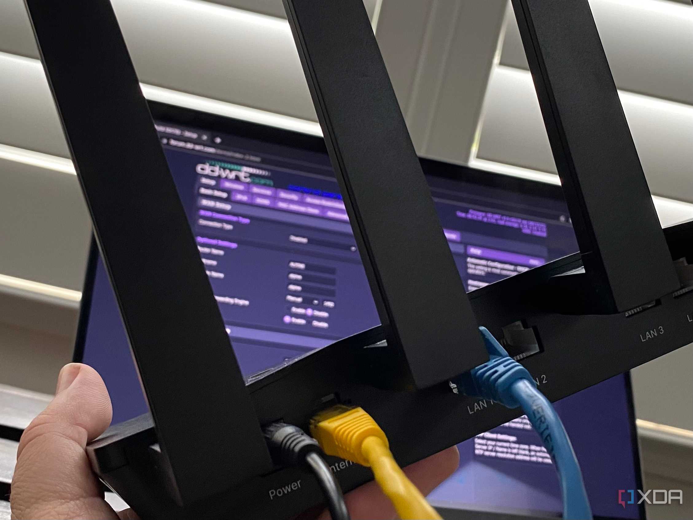 Wi-Fi router with DD-WRT software on a laptop