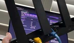 Wi-Fi router with DD-WRT software on a laptop