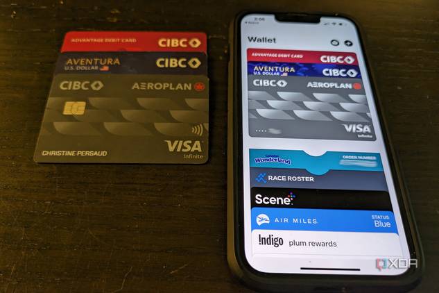 Apple wallet on iPhone next to physical bank cards