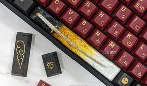 An image of a mechanical keyboard with GMK Red Samurai keycaps kept on a white marble.