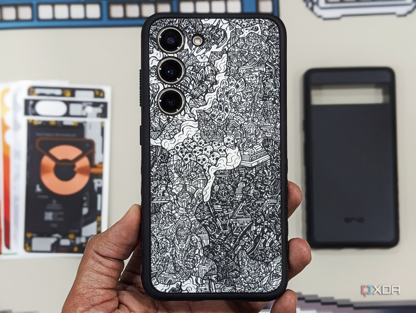 A image of a person holding a Galaxy S23 with Dbrand's Grip case on it.