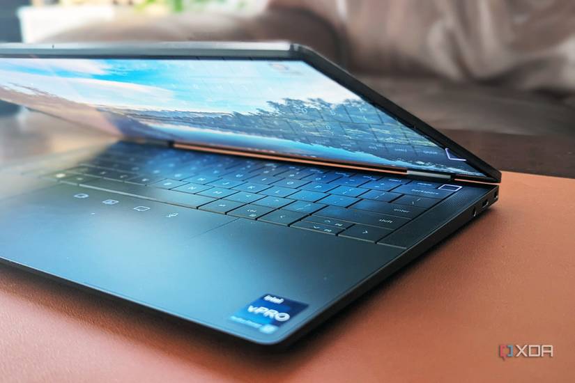The Dell Latitude 9440 with the lid open showing the sides