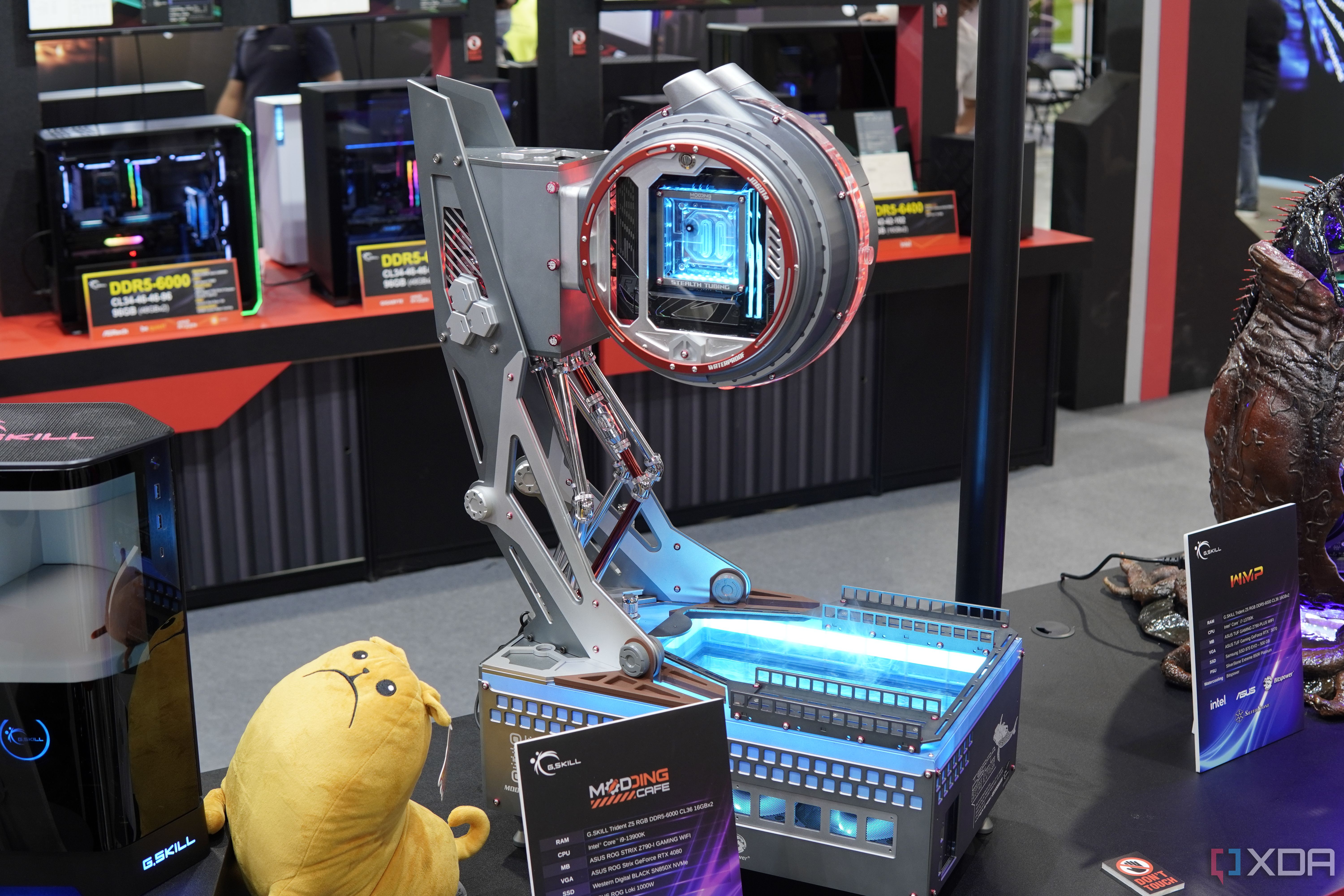 A custom-built computer designed by Modding Cafe, featuring a mechanical design
