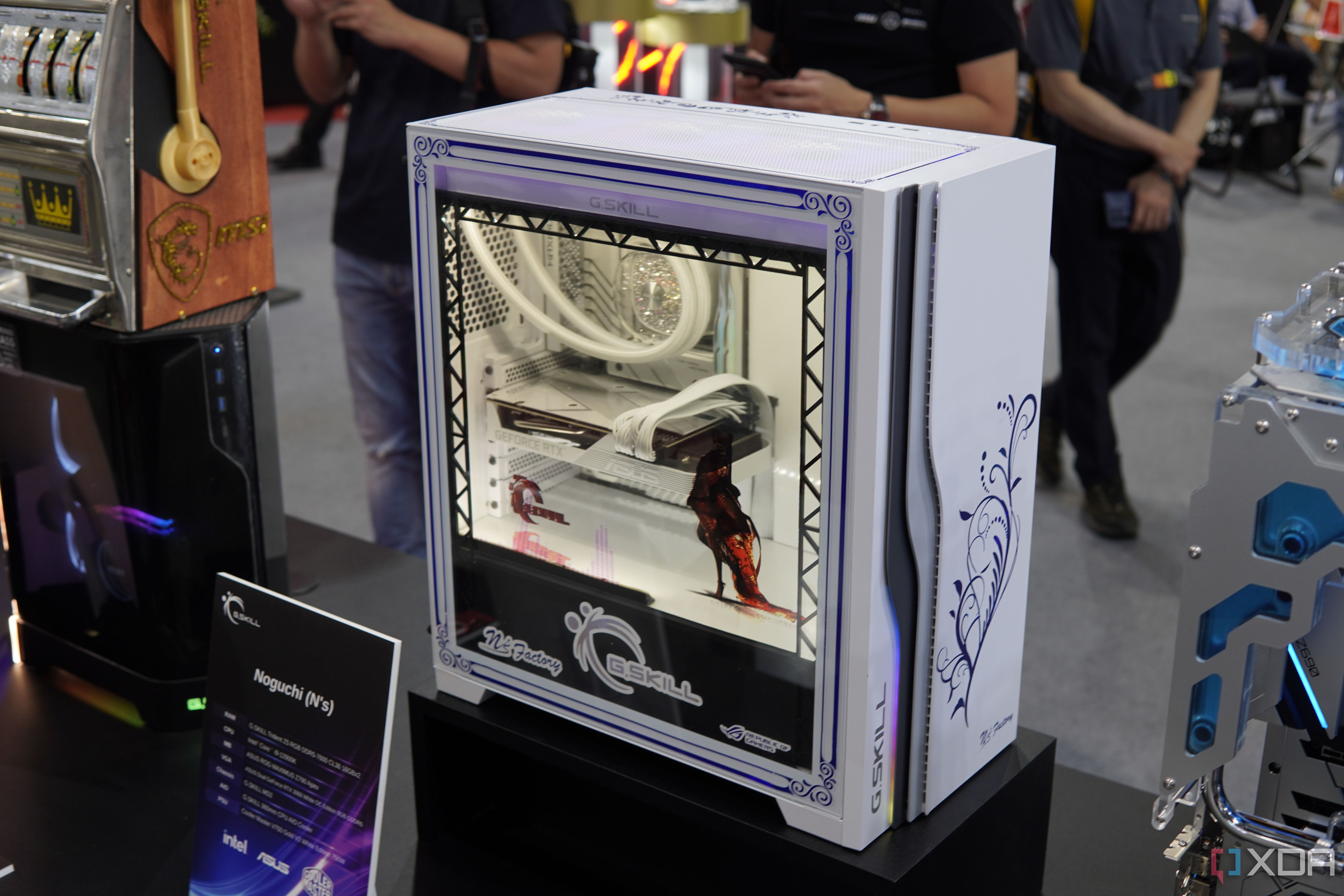 A custom PC build with a transparent side panel that's also an animated display. 