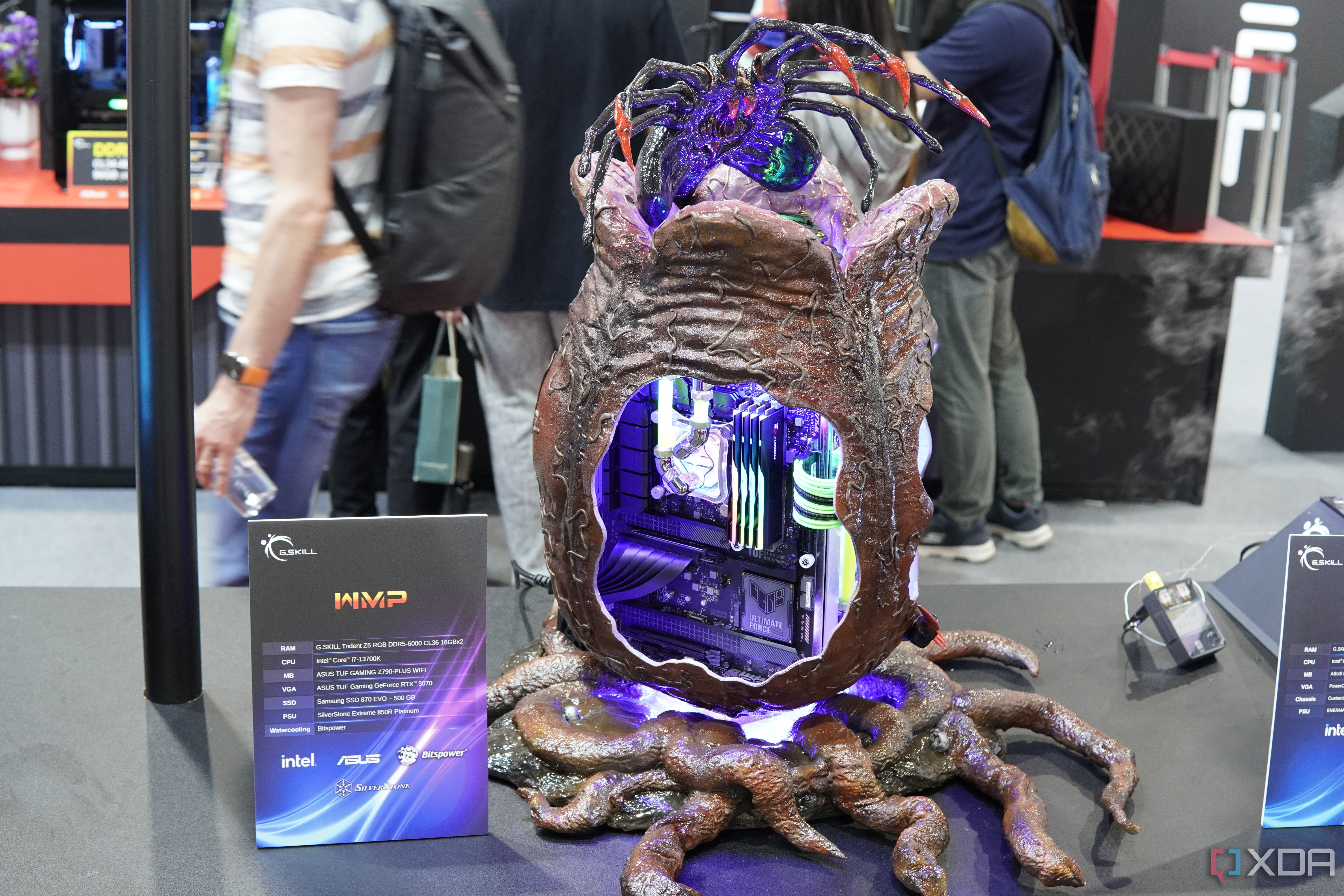 A csutom-built PC made to look like an alien's nest, with roots at the bottom and an alien creature on top