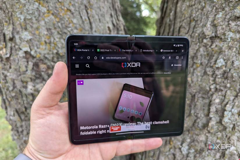 Google Pixel Fold in hand showing the inner display
