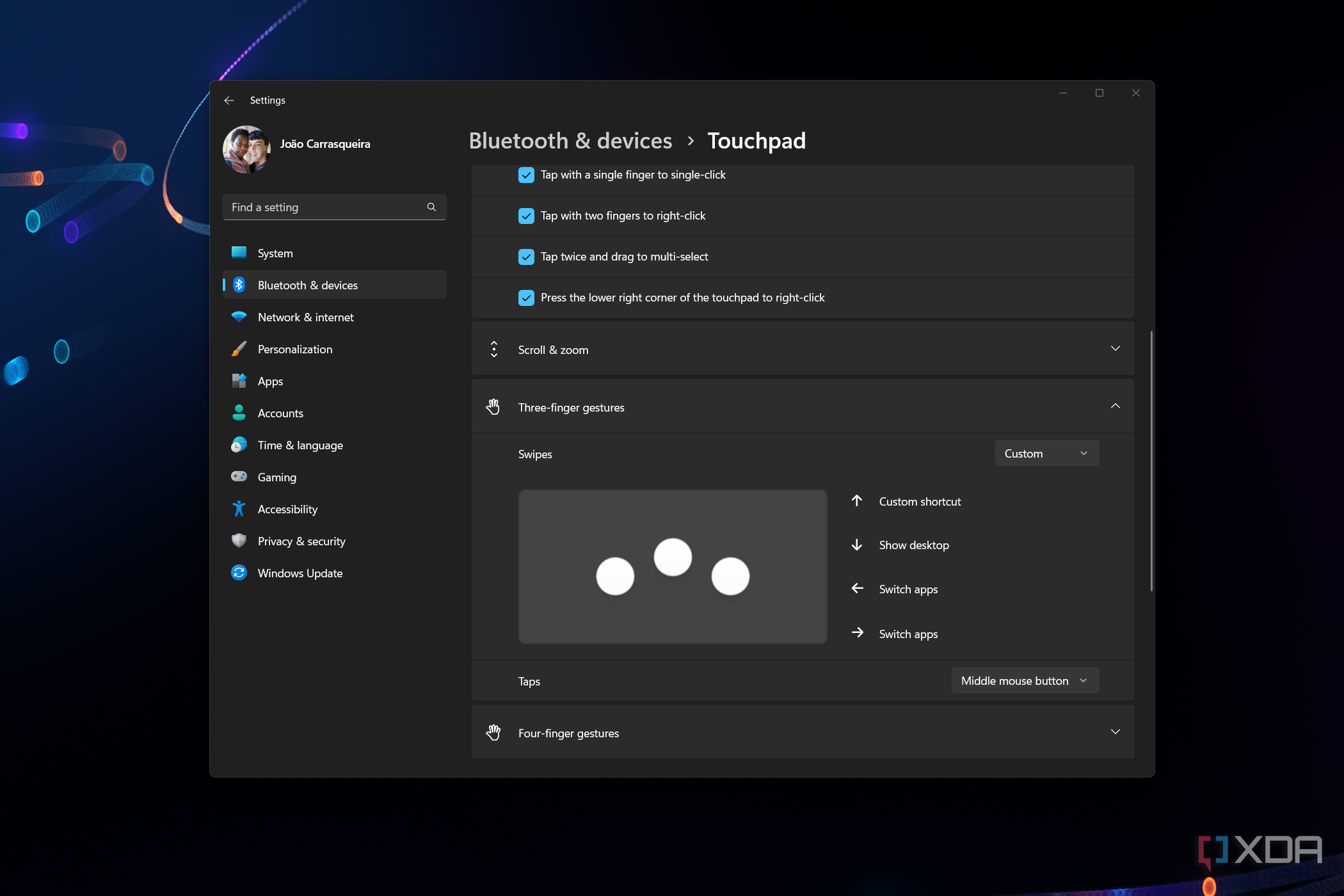 Screenshot of Windows 11 touchpad settings open over the desktop background