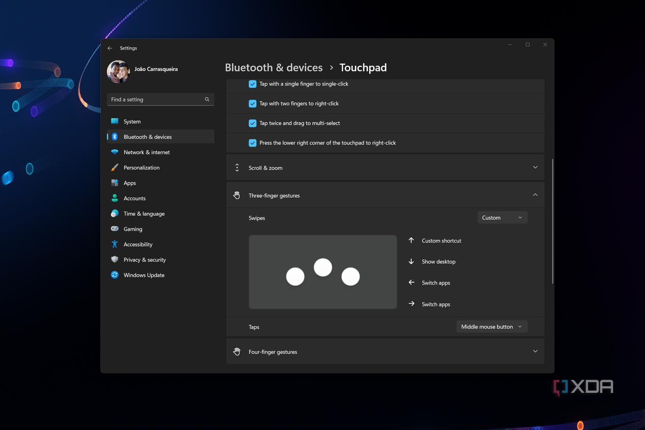 Screenshot of Windows 11 touchpad settings open over the desktop background