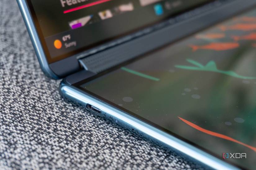 The speaker grill hidden in the Yoga Book 9i's hinge. 