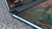 The speaker grill hidden in the Yoga Book 9i's hinge.
