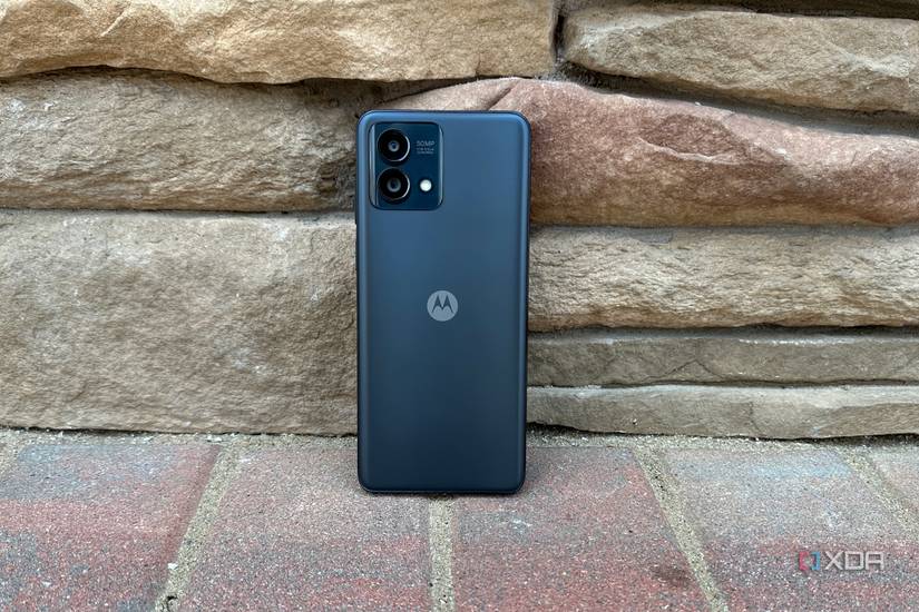 The Moto G Stylus (2023) against a brick background. 