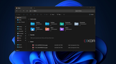 Screenshot of the new File Explorer open over the Windows 11 desktop in dark mode