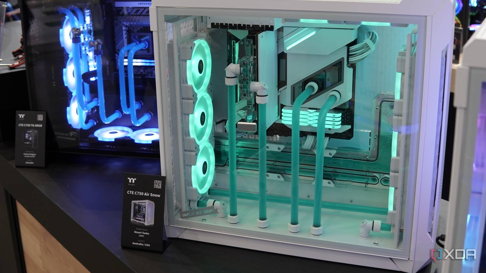 A custom PC build based on the Thermaltake CTE C750 Air Snow with mint green accents