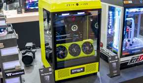 A custom PC based on Thermaltake's The Tower 500 case modified with a lime green chassis. The installed GPU is also colored lime green