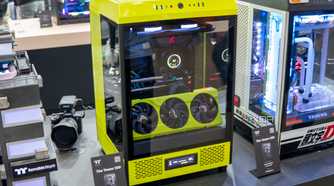 A custom PC based on Thermaltake's The Tower 500 case modified with a lime green chassis. The installed GPU is also colored lime green