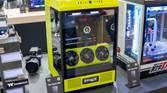 A custom PC based on Thermaltake's The Tower 500 case modified with a lime green chassis. The installed GPU is also colored lime green