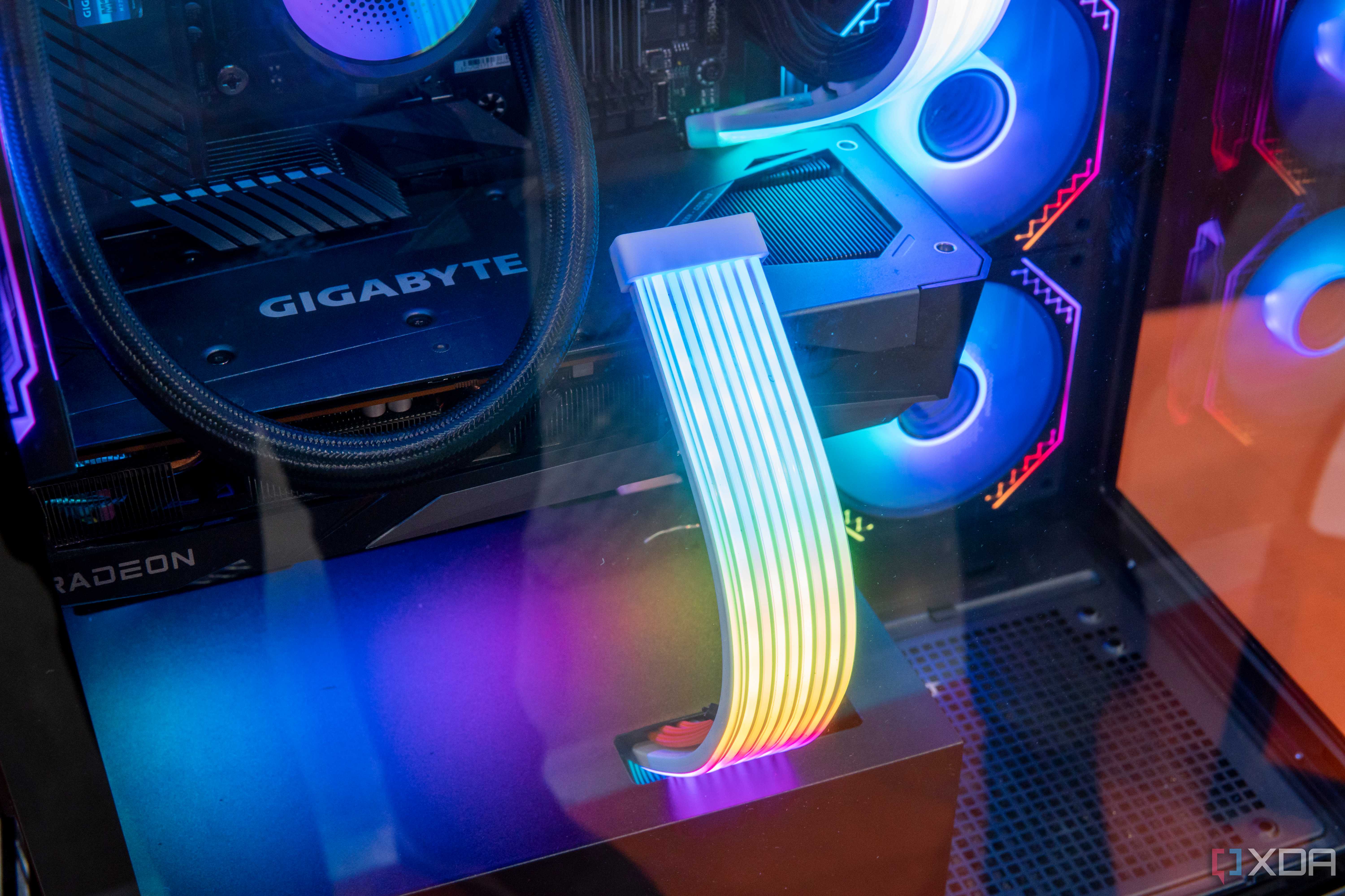 Close-up view of the Xigmatek Endorphin 9 showing RGB cables