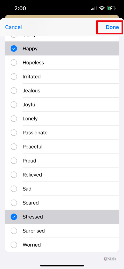 Apple Health app on iPhone with a list of feelings, Stressed selected and Done highlighted.