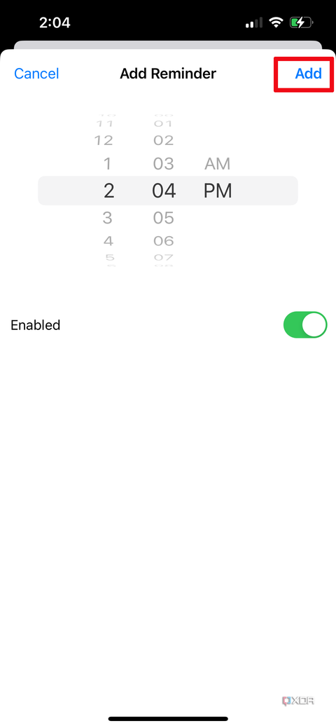 Apple Health app on iPhone with a time wheel to set a time for a reminder