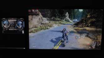 A monitor showing the FPS in Days Gone and another monitor with MSI Afterburner open