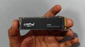 User holding the Crucial T700 SSD in hand