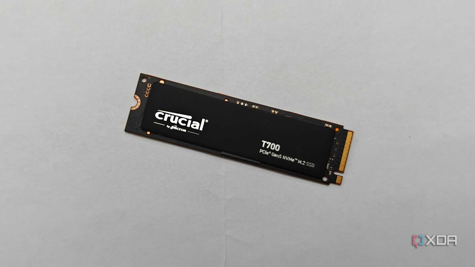 Illustration of the Crucial T700 SSD on a white background