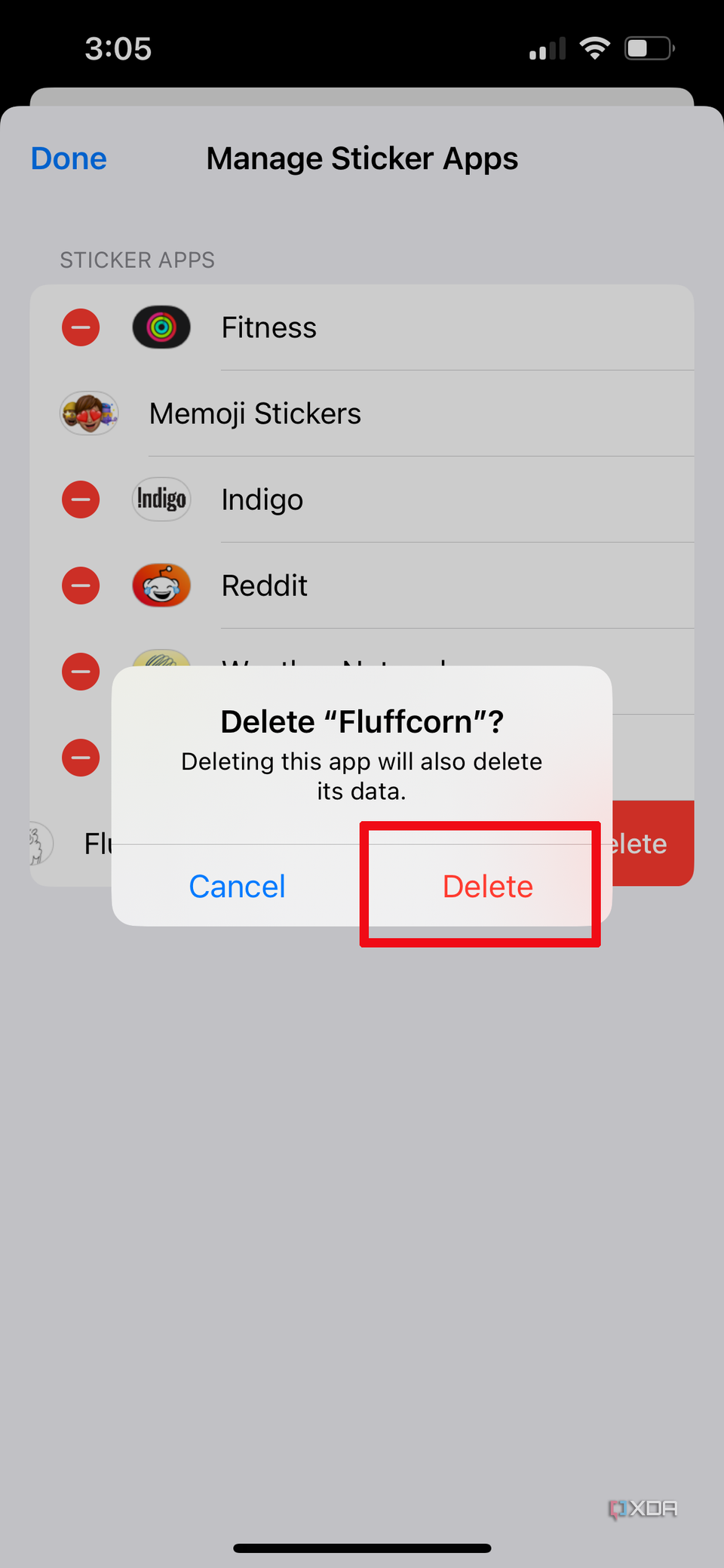 a pop up to confirm the deletion of a sticker pack called Fluffcorn on iPhone