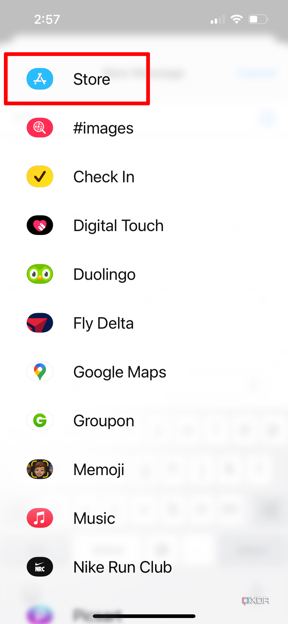 iPhone Sticker menu in Messages showing Store selected.