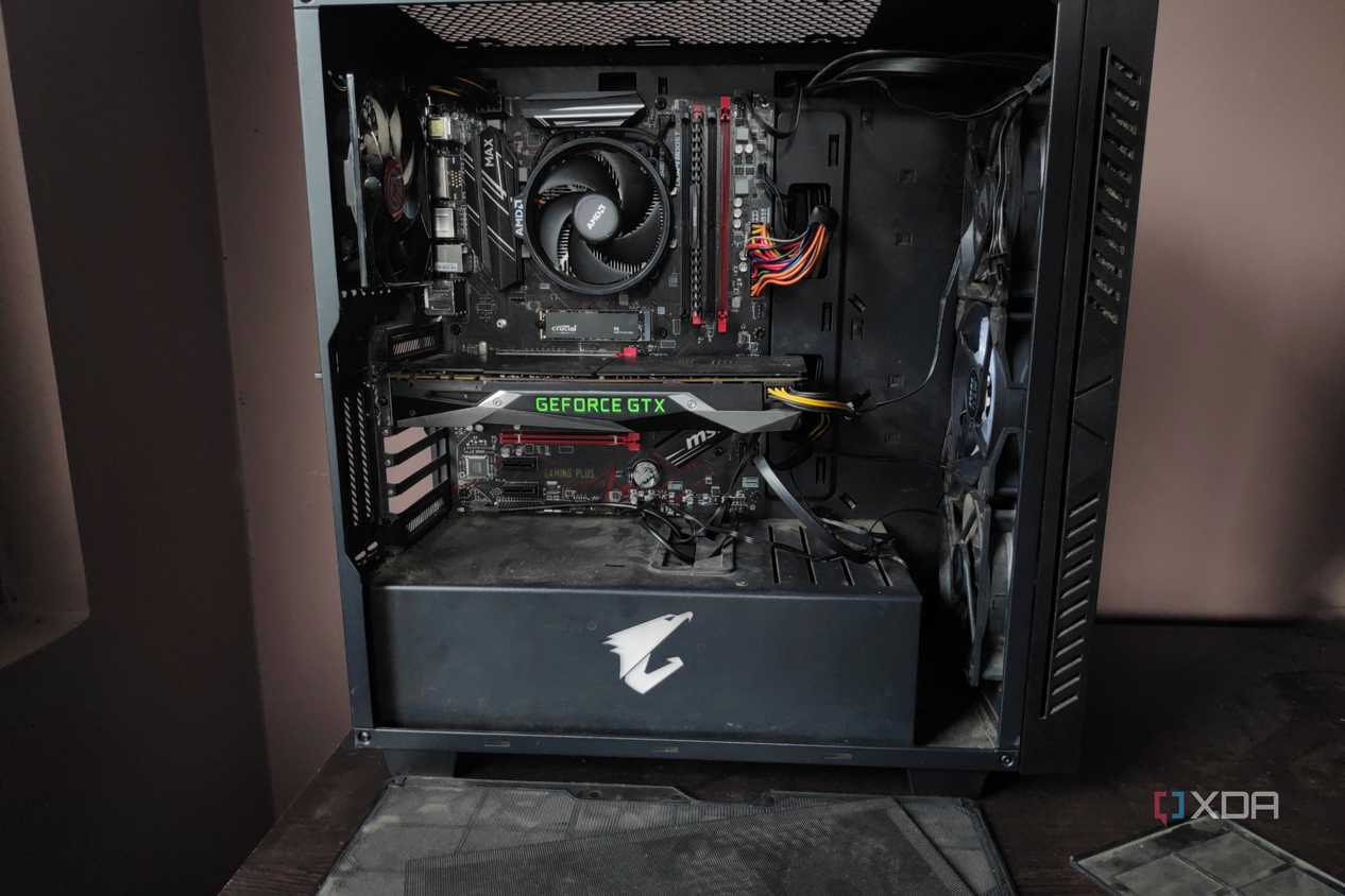 Front view of a dusty PC along with its dust filters