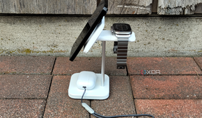 The ESR stand with an iPhone, Apple Watch, and AirPods on it.