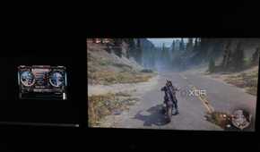 A monitor showing the FPS in Days Gone and another monitor with MSI Afterburner open