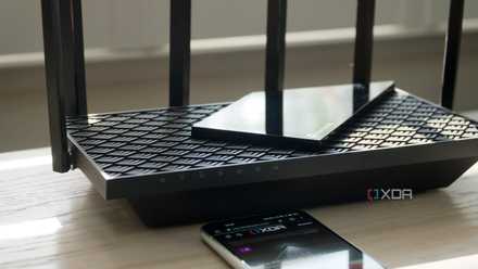 TP-Link Archer AXE75 tri-band on a bench