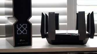 TP-Link Archer BE800 Wi-Fi 7 next to an Archer AXE300
