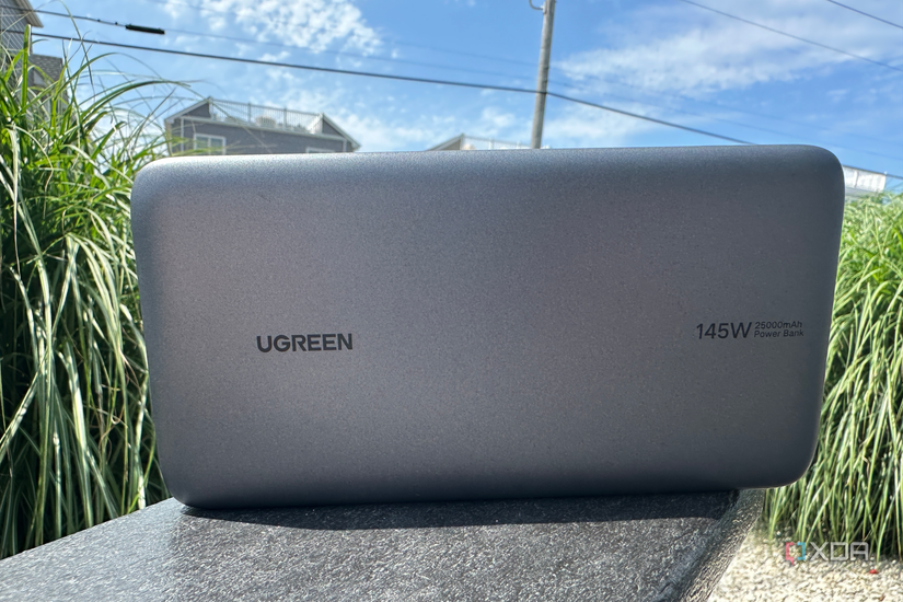 UGreen's 145W Power Bank resting on a chair.