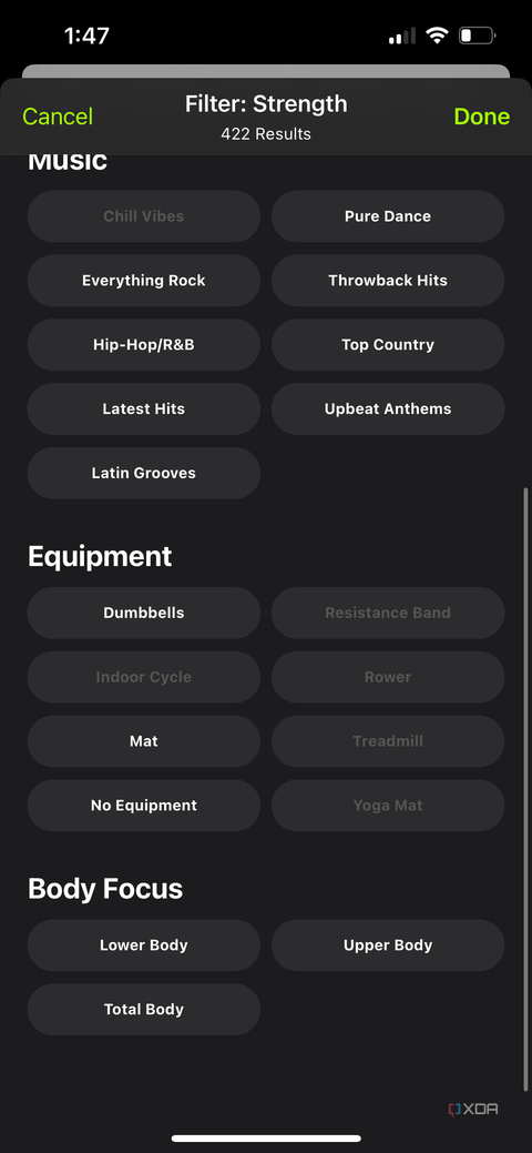 Filters for a Strength workout in the Apple Fitness app showing music, equipment, and body focus