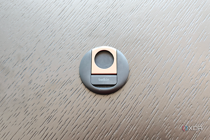 Belkin's MagSafe Mount resting on a wooden table.