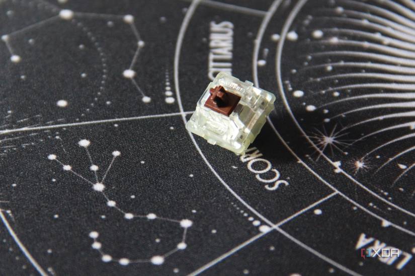 A closeup of the Cherry MX2A brown switch on a mat