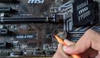 An image of a CMOS battery inside an MSI B450-A Pro motherboard