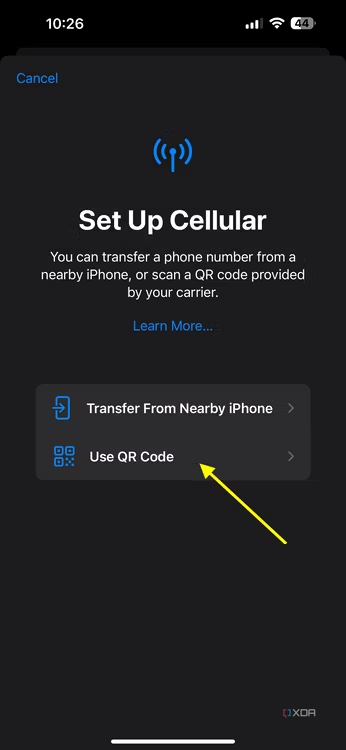 Screenshot of Set Up Cellular page on iOS with an arrow pointing at the Use QR Code option.