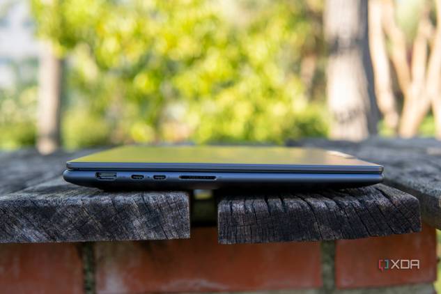 Left-side view of the Lenovo Slim Pro 9i 14-inch model with an HDMI port, two USB Type-C ports, and an SD card reader