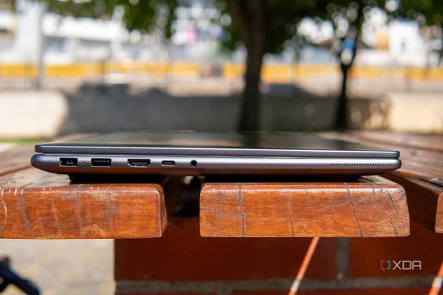 Left-side view of the Lenovo Slim Pro 9i 16-inch model with a power adapter port, a USB Type-A port, HDMI, Thunderbolt 4, and a headphone jack
