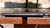 Right-side view of the Lenovo Slim Pro 9i 16-inch model with a USB Type-A port, SD card reader, power button, and a webcam kill switch